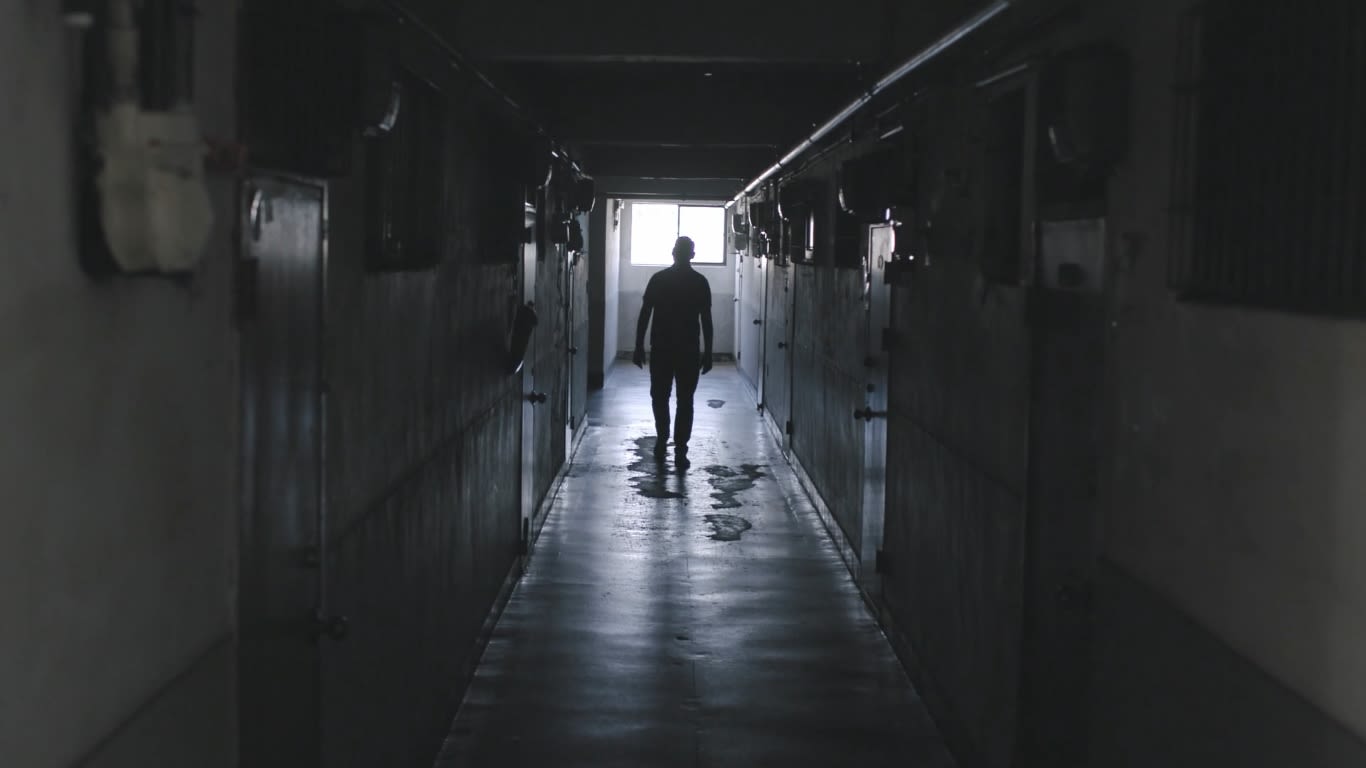 ritish sound artist Steve Hellier walking through an apartment block in Seoul.
