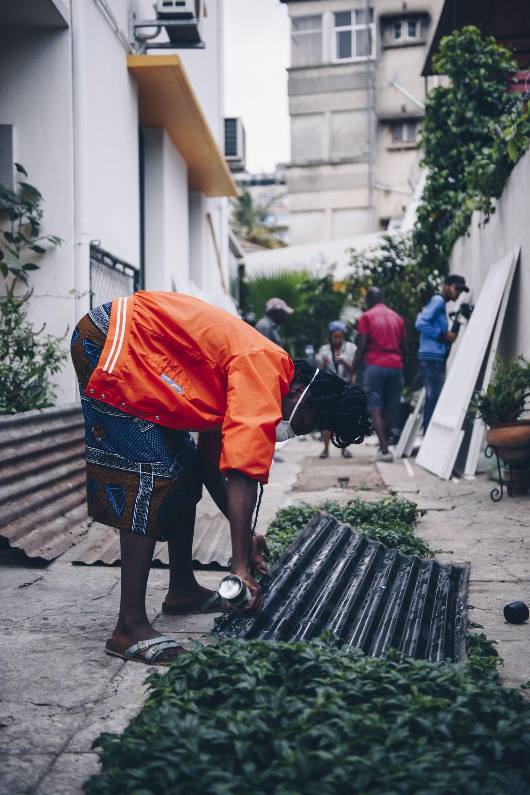 Close up of artist Kyle assembling her work for the exhibition at Maputo Fast Forward.